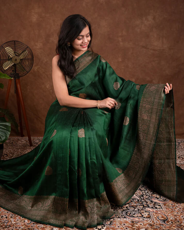 Surpassing Dark Green Soft Silk Saree With Dazzling Blouse Piece