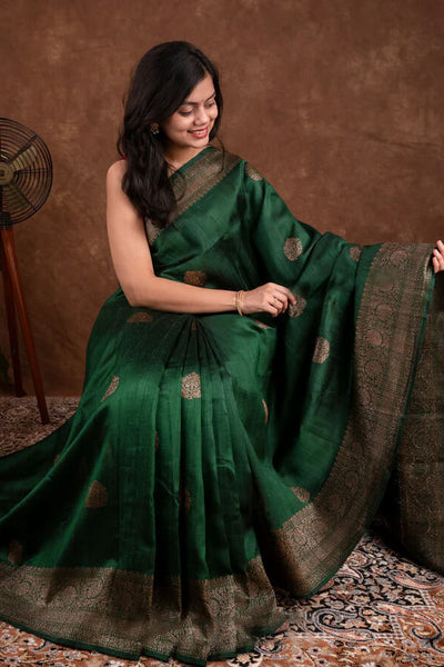 Surpassing Dark Green Soft Silk Saree With Dazzling Blouse Piece