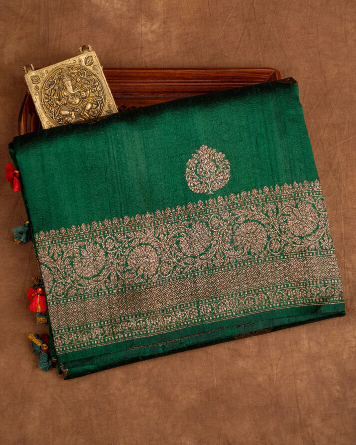 Surpassing Dark Green Soft Silk Saree With Dazzling Blouse Piece