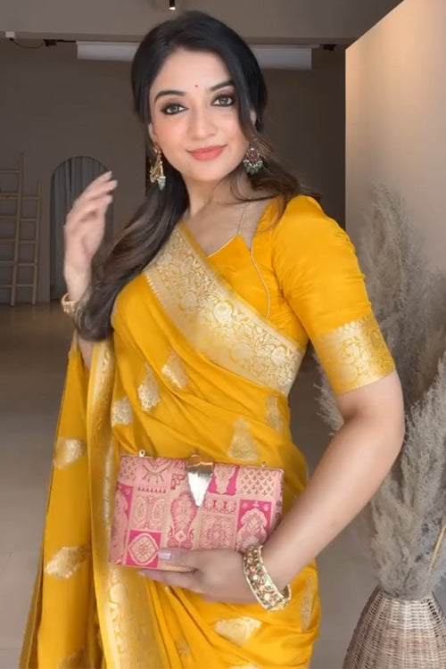 Load image into Gallery viewer, Extraordinary Yellow Soft Silk Saree With Glowing Blouse Piece
