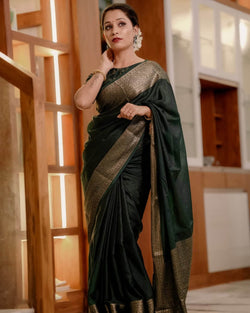 Luxuriant Dark Green Soft Silk Saree With Allure Blouse Piece