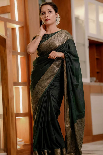 Luxuriant Dark Green Soft Silk Saree With Allure Blouse Piece