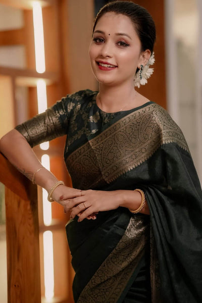 Luxuriant Dark Green Soft Silk Saree With Allure Blouse Piece