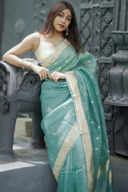 Moiety Turquoise Banarasi Silk Saree With Panoply Blouse Piece