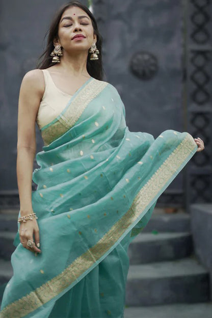 Moiety Turquoise Banarasi Silk Saree With Panoply Blouse Piece