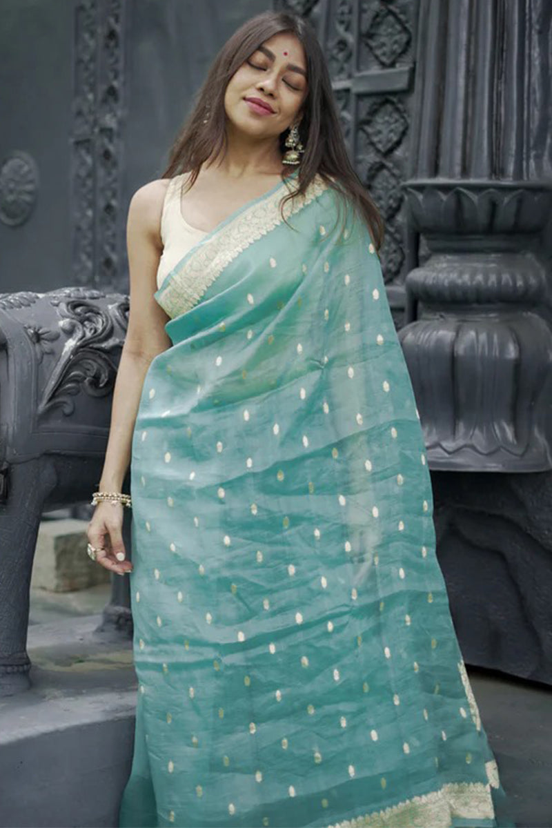 Moiety Turquoise Banarasi Silk Saree With Panoply Blouse Piece