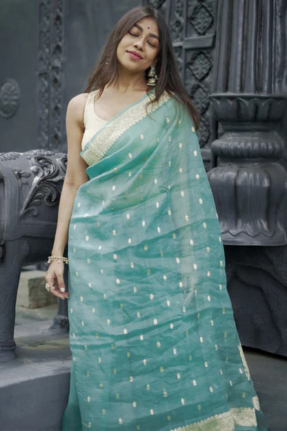 Moiety Turquoise Banarasi Silk Saree With Panoply Blouse Piece