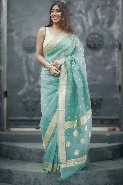 Moiety Turquoise Banarasi Silk Saree With Panoply Blouse Piece