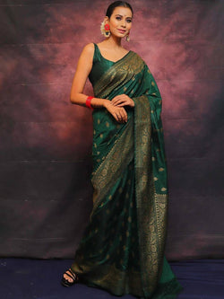 Adorning Dark Green Soft Silk Saree With Prominent Blouse Piece