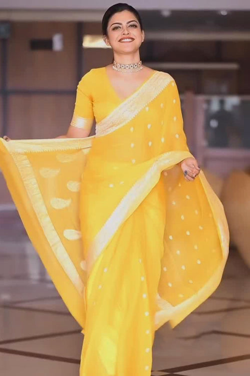 Load image into Gallery viewer, Exquisite Yellow Soft Silk Saree With Profuse Blouse Piece
