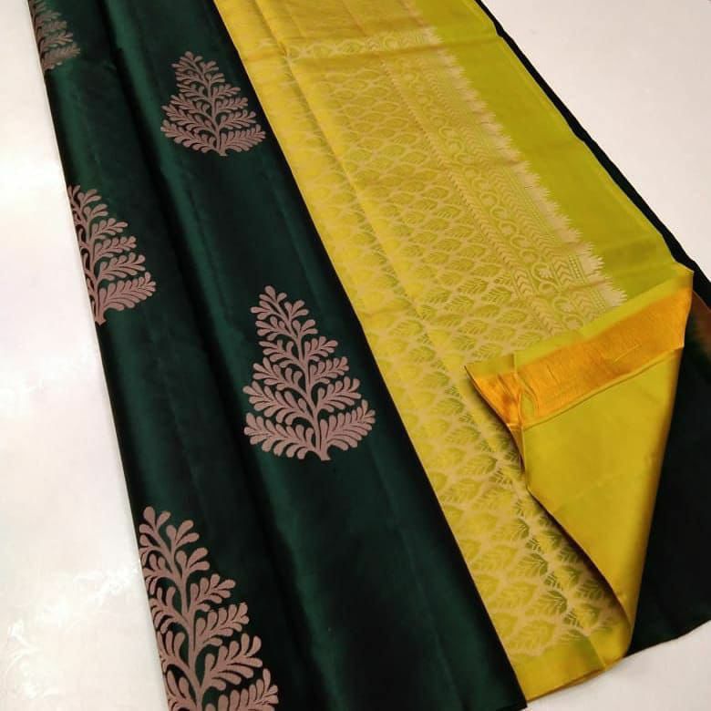 Deserving Dark Green Soft Silk Saree With Glowing Blouse Piece