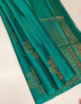 Traditional Firozi Soft Silk Saree With Exemplary Blouse Piece