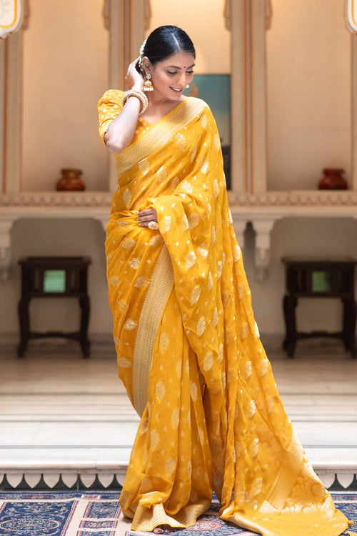 Load image into Gallery viewer, Hypnotic Yellow Soft Banarasi Silk Saree With Impressive Blouse Piece
