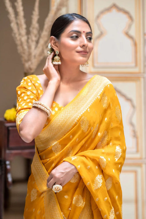 Load image into Gallery viewer, Hypnotic Yellow Soft Banarasi Silk Saree With Impressive Blouse Piece
