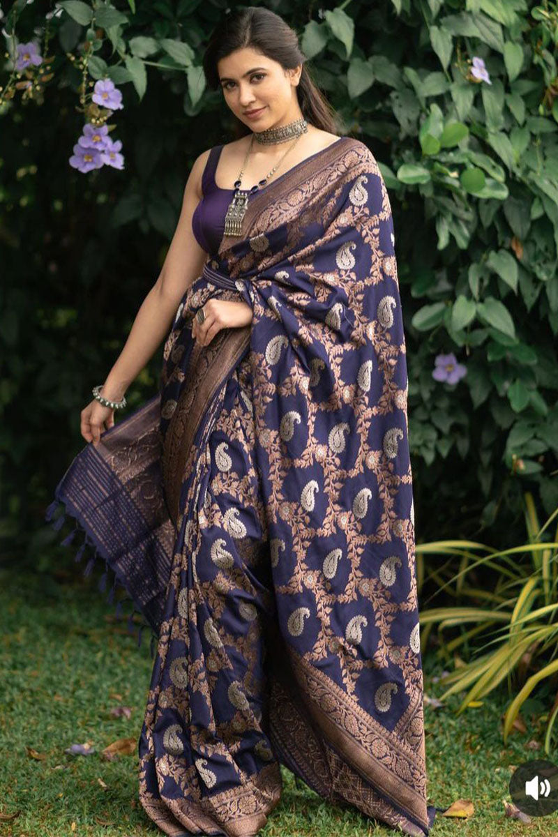 Engrossing Navy Blue Soft Silk Saree With Delightful Blouse Piece