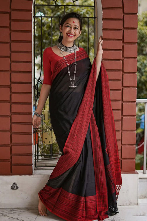 Load image into Gallery viewer, Marvellous Black Cotton Silk Saree With Demanding Blouse Piece
