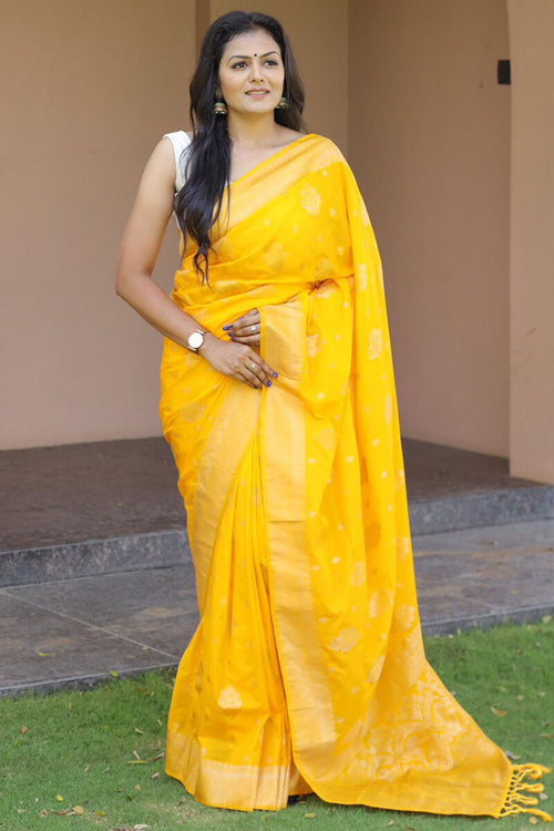 Load image into Gallery viewer, Demanding Yellow Soft Banarasi Silk Saree With Adorable Blouse Pieced
