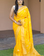 Demanding Yellow Soft Banarasi Silk Saree With Adorable Blouse Piece