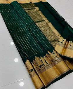 Elaborate Dark Green Soft Silk Saree With Grandiose Blouse Piece