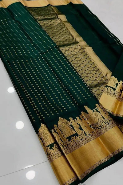 Elaborate Dark Green Soft Silk Saree With Grandiose Blouse Piece