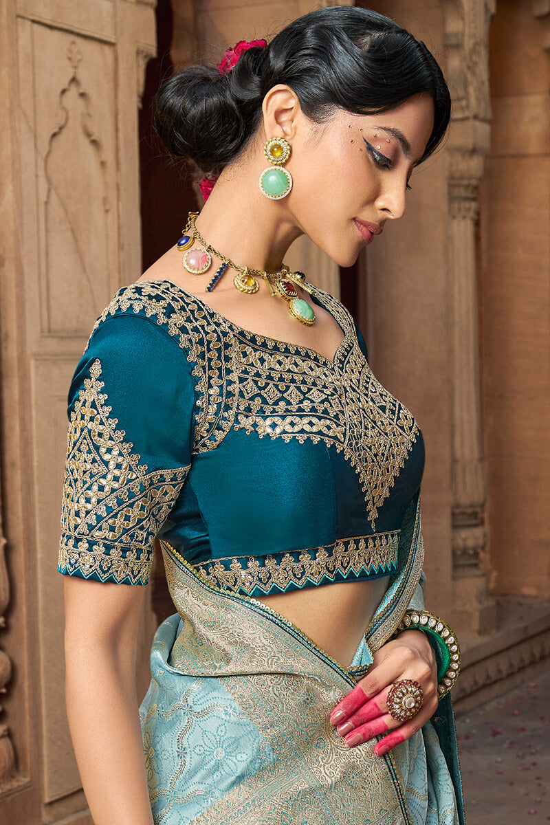 Stunning Sky Banarasi Satin Silk Saree With Energetic Blouse