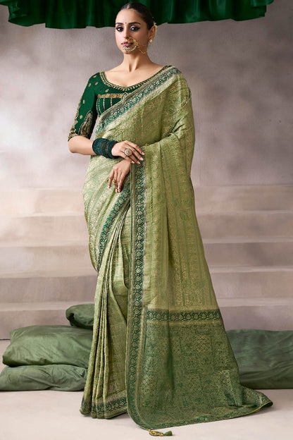 Flamboyant Green Banarasi Satin Silk Saree With Traditional Blouse