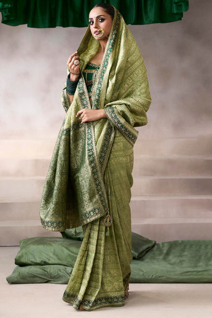 Flamboyant Green Banarasi Satin Silk Saree With Traditional Blouse