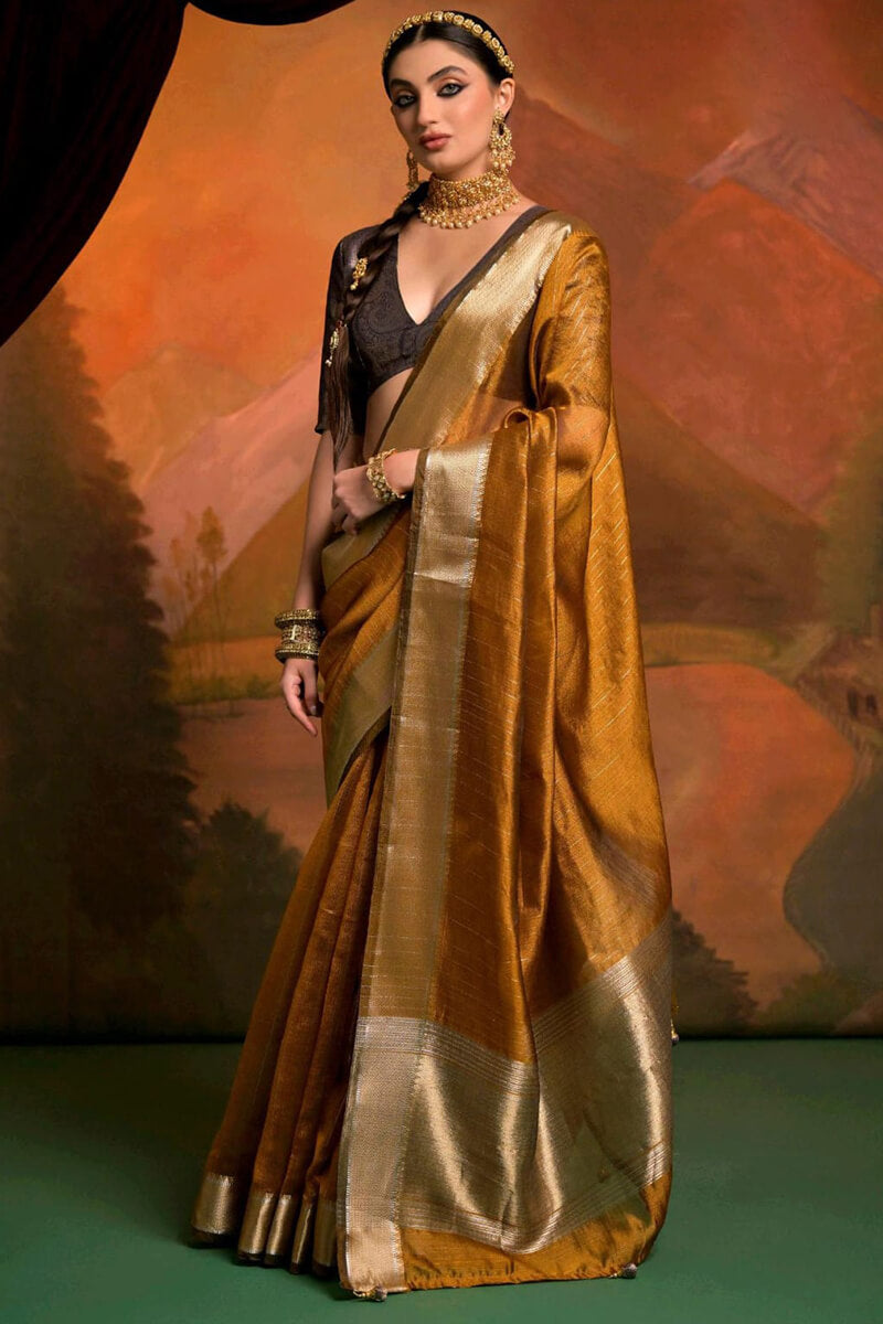 Gossamer Mustard Soft Banarasi Silk Saree With Enthralling Blouse Piece