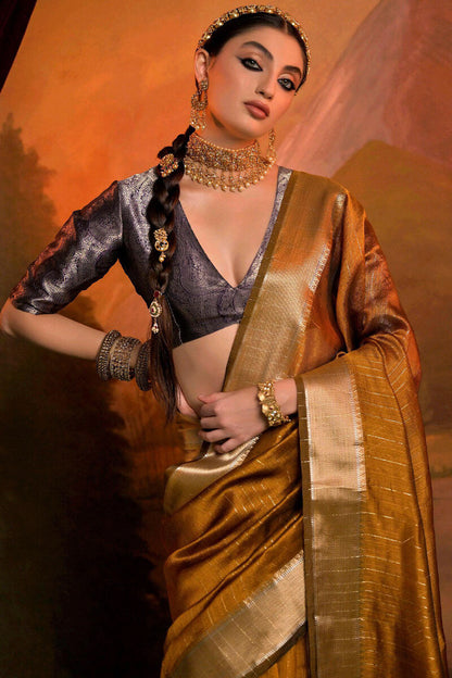 Gossamer Mustard Soft Banarasi Silk Saree With Enthralling Blouse Piece