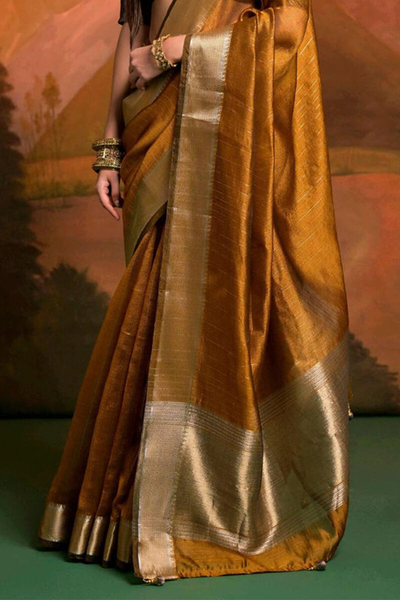 Gossamer Mustard Soft Banarasi Silk Saree With Enthralling Blouse Piece