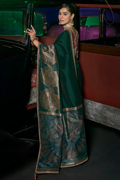 Engrossing Dark Green Banarasi Satin Silk Saree With Gossamer Blouse