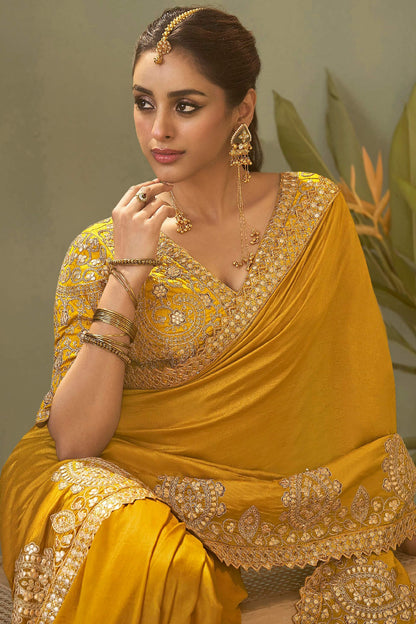Seraphic Yellow Soft Silk Embroidery Work Saree With Dazzling Blouse Piece
