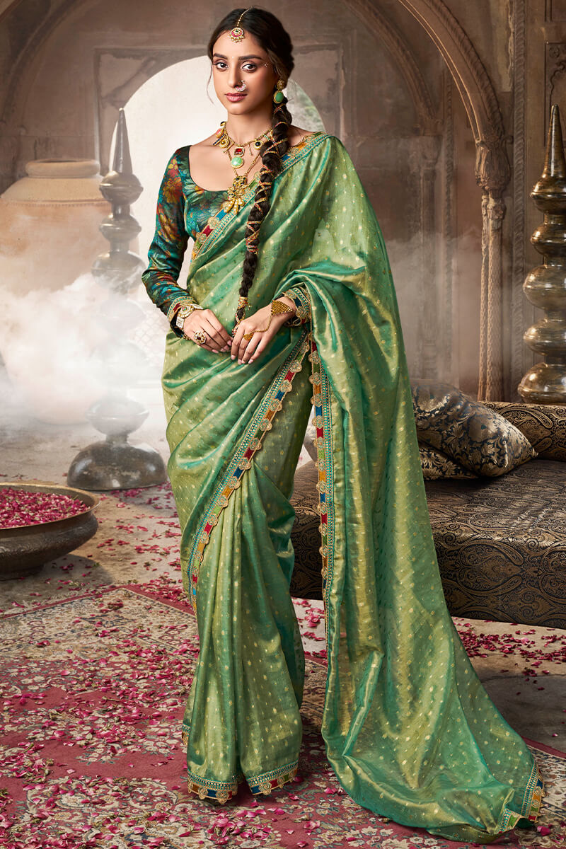 Beleaguer Green Pure Tissue Banarasi Silk Saree With Lustrous Blouse Piece