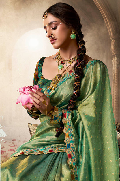 Beleaguer Green Pure Tissue Banarasi Silk Saree With Lustrous Blouse Piece