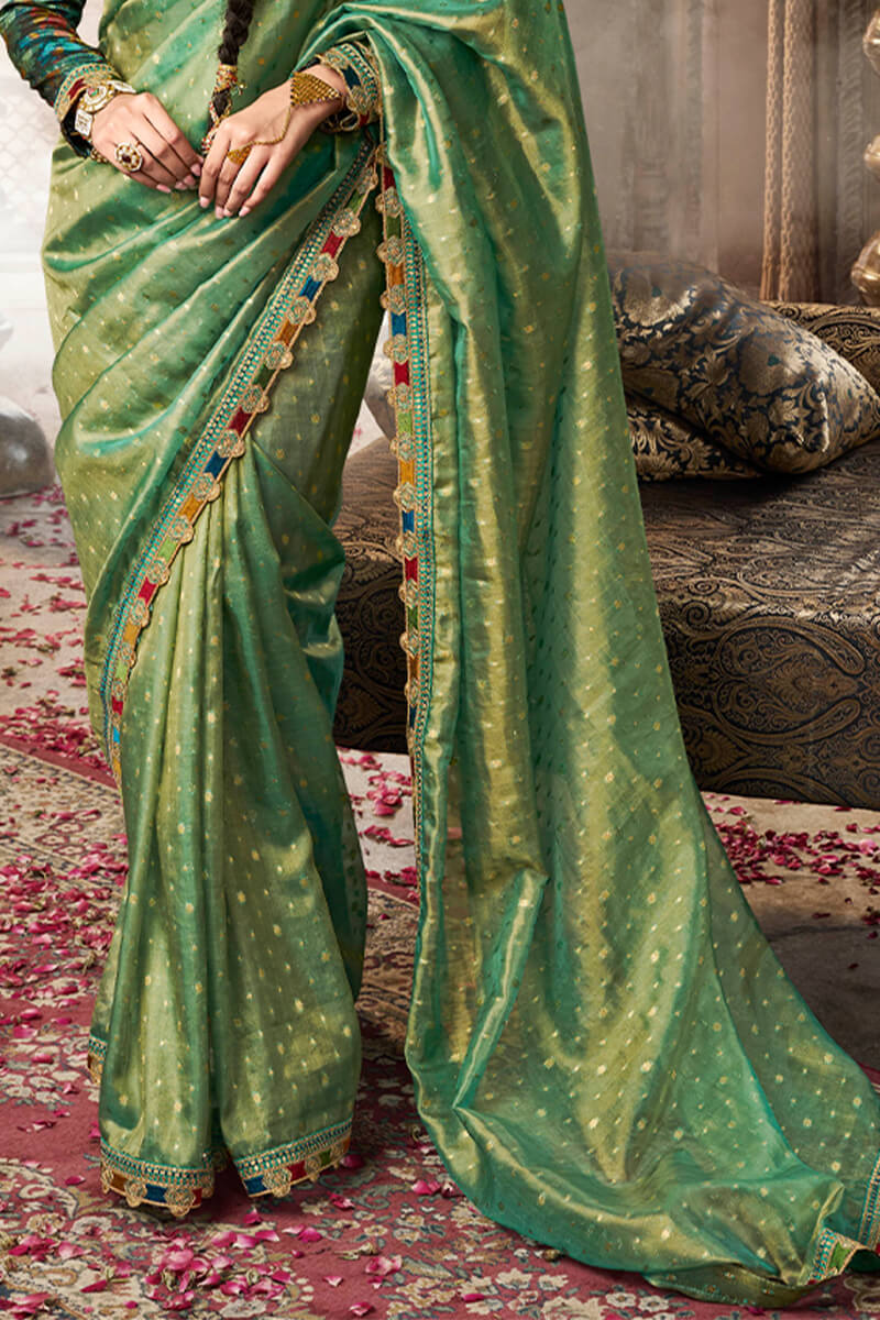 Beleaguer Green Pure Tissue Banarasi Silk Saree With Lustrous Blouse Piece