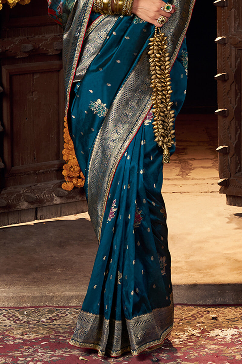 Lovely Teal Blue Pure Viscose Dola Silk Saree With Exceptional Blouse Piece