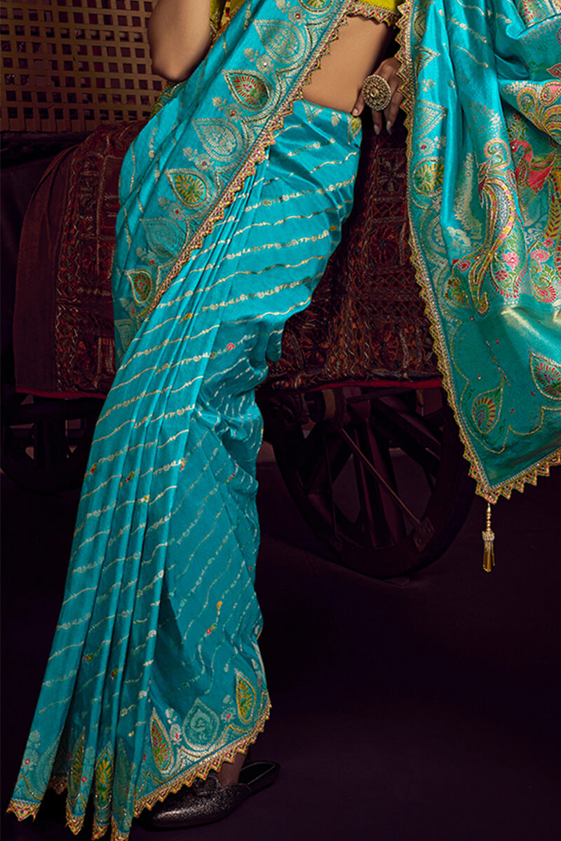 Precious Firozi Pure Viscose Dola Silk Saree With Blooming Blouse Piece