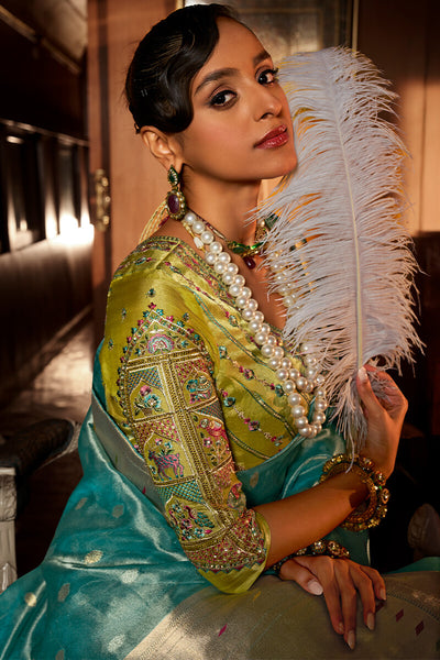 Splendorous Turquoise Paithani Silk Saree With Appealing Blouse Piece
