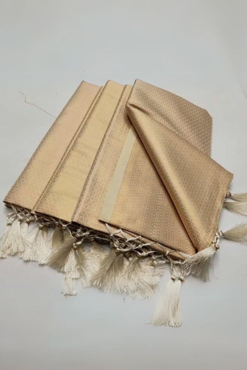 Innovative Beige Kanjivaram Silk Saree With Flaunt Blouse Piece