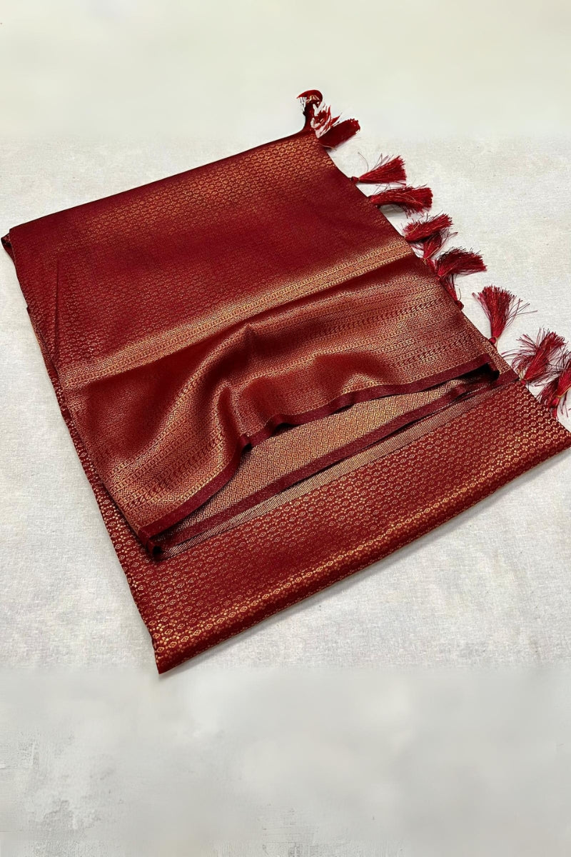 Lassitude Maroon Kanjivaram Silk Saree With Scintilla Blouse Piece