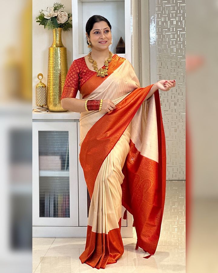 Delightful Beige Kanjivaram Silk Saree With Adorning Blouse Piece