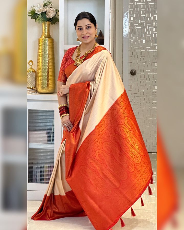 Delightful Beige Kanjivaram Silk Saree With Adorning Blouse Piece