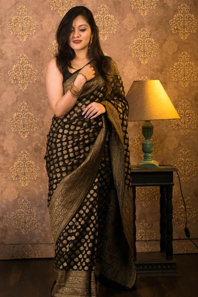 Dazzling Black Soft Banarasi Silk Saree With Gleaming Blouse Piece