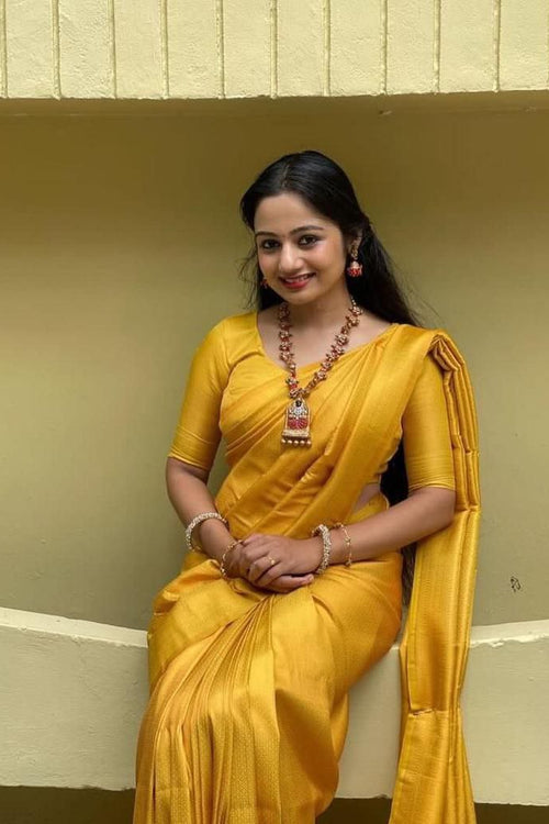 Load image into Gallery viewer, Exceptional Yellow Kanjivaram Silk Saree With Smart Blouse Piece
