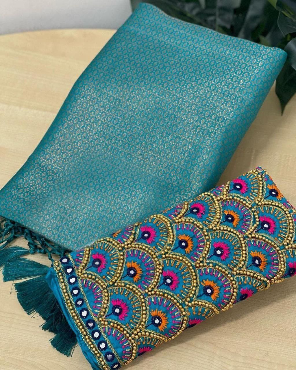 Scrumptious Firozi Kanjivaram Silk Saree With Two Enigmatic Blouse Piece