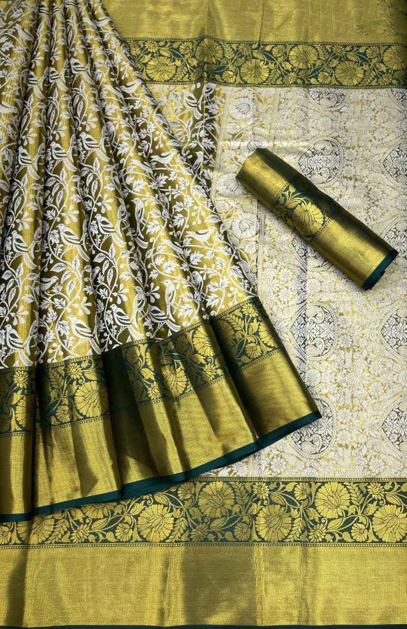 Innovative Dark Green Kanjivaram Silk Saree With Alluring Blouse Piece