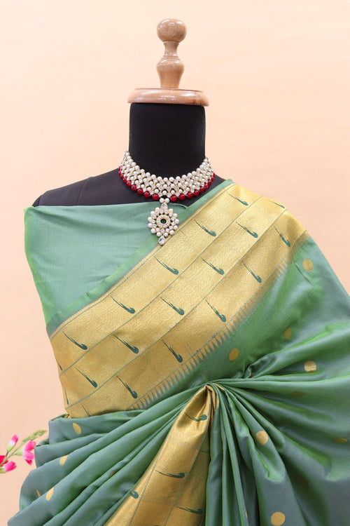 Load image into Gallery viewer, Ephemeral Teal Green Paithani Silk Saree With Fragrant Blouse Piece
