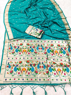 Enticing Sea Green Paithani Silk Saree With Ephemeral Blouse Piece