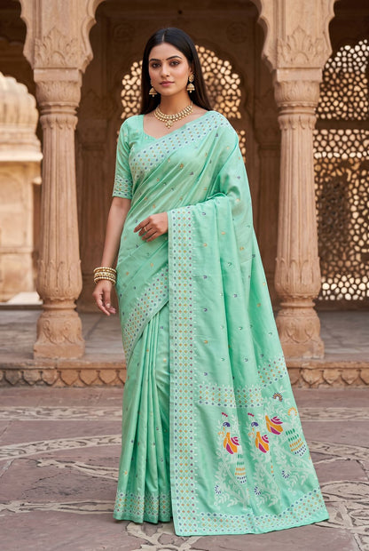 Artistic Sea Green Pure Banarasi Silk Saree With Gleaming Blouse Piece