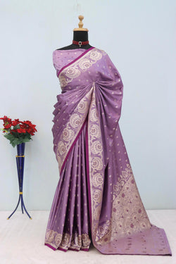 Fugacious Lavender Banarasi Satin Silk Saree With Gorgeous Blouse